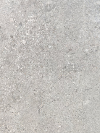 Abstract background, pattern on gray concrete surface wall. Rough, mottled gray concrete texture,...
