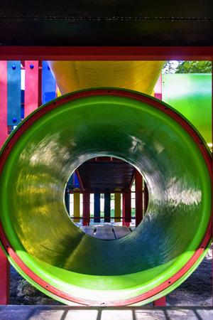 Colorful childrens attraction in the park. Care for children. Relaxation, favorite entertainment....