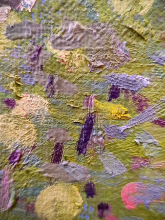 Multicolored chaotic strokes of oil paint on rough canvas. In pastel soft purple tones. Close-up. Selective focus.の写真素材