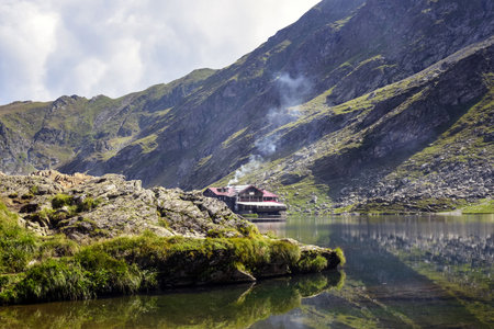 Picturesque landscape with the Balea cottage in the Fagaras mountains (Transfagarasan) - Romania.の写真素材