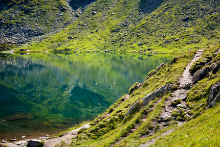 Picturesque view of Lake Balea in the Fagaras mountains (Transfagarasan) - Romania. Selective focusの写真素材