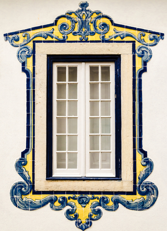 white wondow white a frame of tile (azulejos) and ornament motif, portugal symbolの写真素材