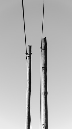 an old fashion pool with cable s and wires, symbol of communication and internetの写真素材