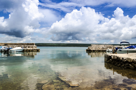 view of old piers in a small harbour in dalmatia ( croatia)のeditorial素材