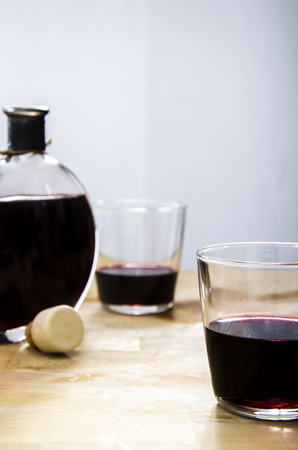 still life with a glass of red wine and bottle. Relax. luxury.の写真素材