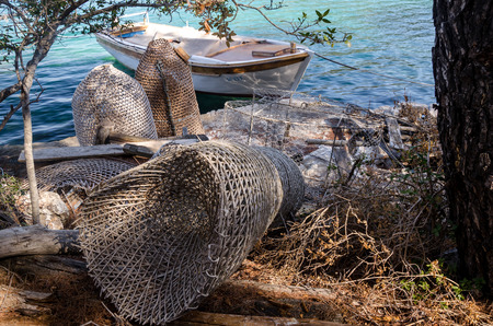 view of seaside at mljiet with a fisherman tools and web left on stairs.の写真素材