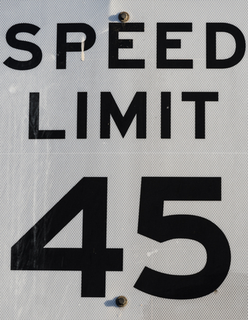 close up of a black and white street sign. symbol of limit and orderの写真素材