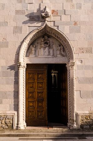 view of the door of Chiesa Fratta in san danieleの写真素材