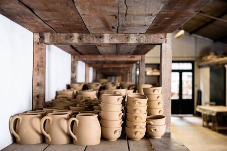 still life of hand made pottery and ceramic bowls