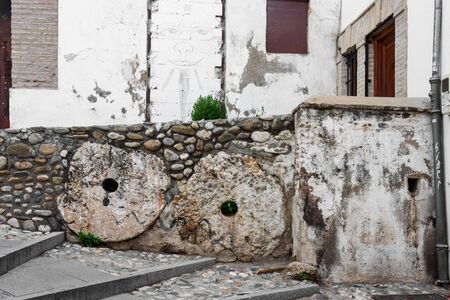 view of a narrow street in albaici, the arab quarter in granada. spain