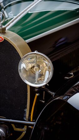 close up of an historic car from the beginning of xx century.