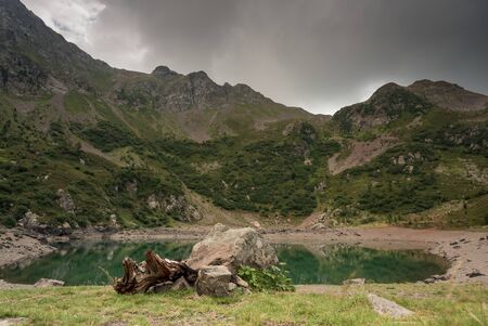 view of an alpine glacier lake over the top of italian alps. a secret place of dolomites. Italyの写真素材