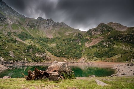 view of an alpine glacier lake over the top of italian alps. a secret place of dolomites. Italyの写真素材