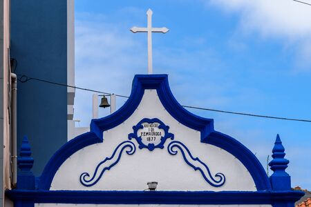 decorated facade of a church in azores with the traditional blue and white colors. portugalの写真素材