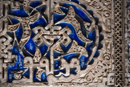 view of the decoration on the wall of the royal palace (alcazar) in seville. spain.のeditorial素材