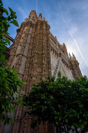 detail of the cathedral in seville, door entrance with statue. spainの写真素材