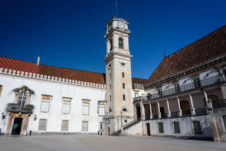 View on the courtyard of the old university with university tower in Coimbra city during the morning in the central Portugalのeditorial素材