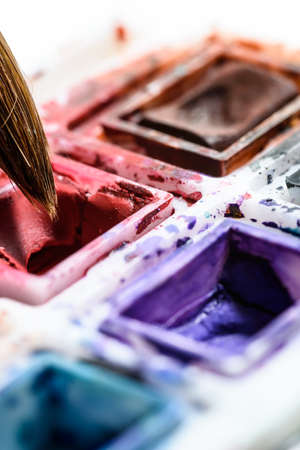 close up of red watercolor and brush artistic. creative.の写真素材