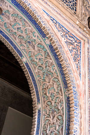 view of the decoration on the wall of the royal palace (alcazar) in seville. spain.のeditorial素材