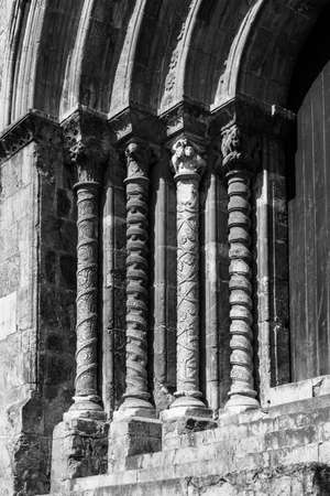 COIMBRA, PORTUGAL - summer 2019: details of Medieval Church of Santiago in Coimbra, Centro region,...