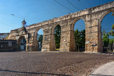 landmarks of Portugal -view of the roman acquedcut in old town of Coimbra. summer 2019のeditorial素材