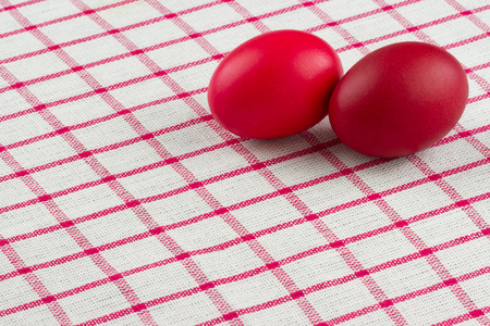 easter eggs an red checked textileの写真素材