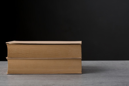 old books on wooden deckの写真素材