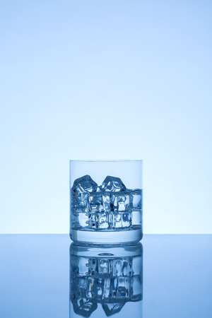 Glass with ice cubesの写真素材
