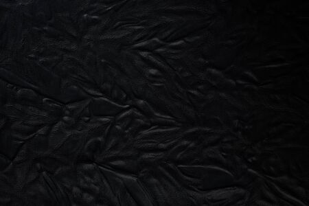black leather texture to backgroundの写真素材