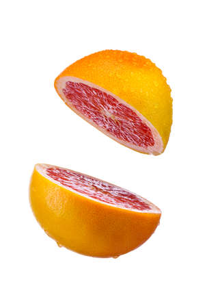 grapefruit sliced on white  backgroundの写真素材