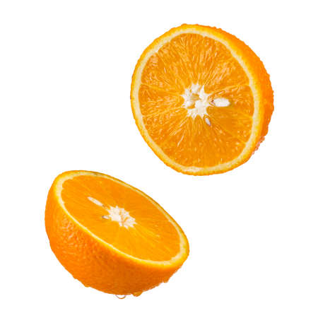 half ripe oranges isolated on a white backgroundの写真素材