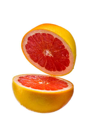 Grapefruit half isolated on white backgroundの写真素材