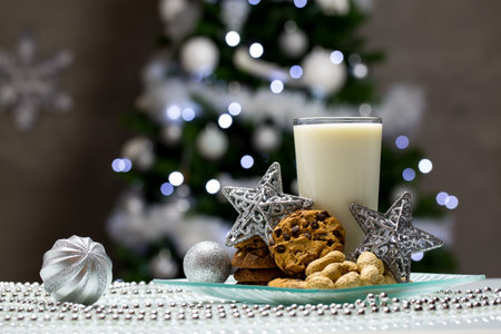 One glass of milk with cookies Christmas treeの写真素材