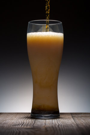Beer. Cold Craft light Beer in a glass. Close up of a pint of beerの写真素材