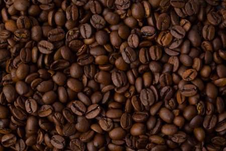 Roasted coffee beans background abstract top viewの写真素材