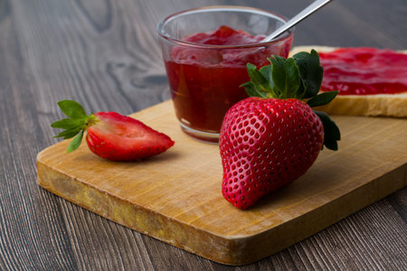 Strawberry jam is made from strawberries, This jam can be used for spreading white bread, filling cakes, etc.の写真素材