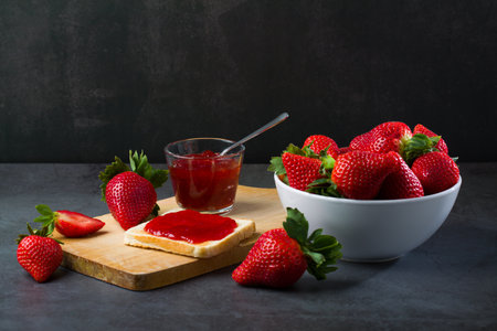 Strawberry jam is made from strawberries, This jam can be used for spreading white bread, filling cakes, etc.の写真素材
