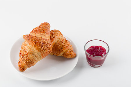 Delicious and sweet croissant with jam