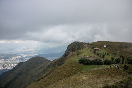 Amazing and scenic landscape with clouds near the TelefériQo station, Quito, Ecuadorのeditorial素材