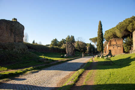 Rome, Italy - 16 January 2021: view of Via Appia Antica in Rome. Some people walking and relaxing in...
