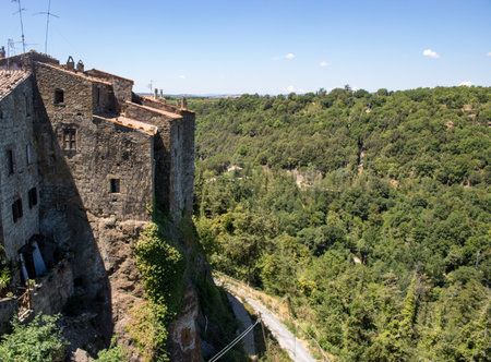 Pitigliano, Italy - July 14, 2022: buildings of Pitigliano in a summer day, Tuscany, Italy.のeditorial素材