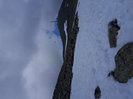 Landscape with snowy mountain rocksの写真素材