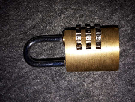 Metal padlock for locking with a code