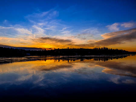 reflection of the rising sun in the water - Lysakerの写真素材