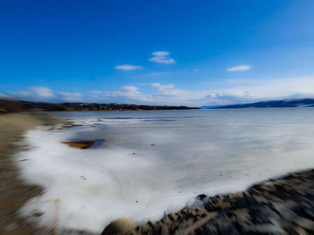 landscape with blue sky and frozen sea - Brumunddalの写真素材