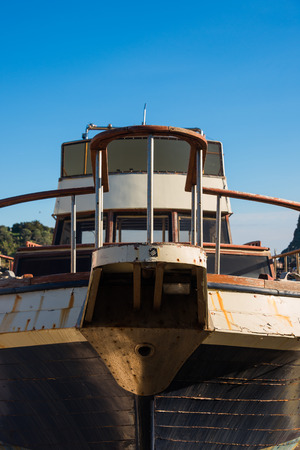 Old fishing boat now out of order. Useful as a renewal conceptの写真素材
