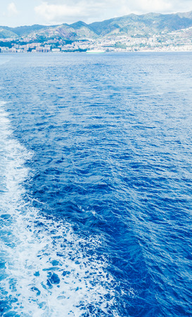 Top view of a ship sailing in the open sea. Useful to indicate a boat trip as a cruiseの写真素材