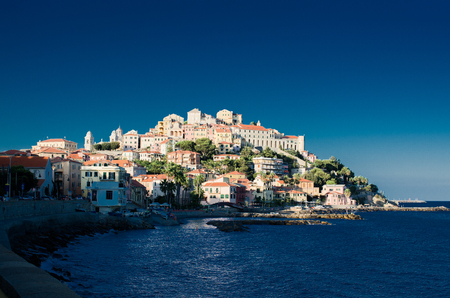 Small fishing village in Liguria. Horizontal view with sea and blue sky. Italyの写真素材