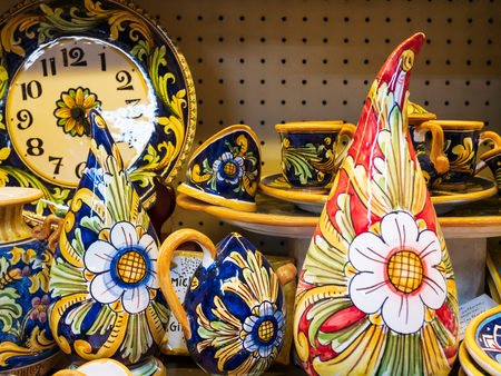 Various hand-painted ceramic objects on display for sale. Horizontal viewの写真素材