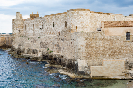 Beautiful view of Maniace castle in Ortigia Syracuse, in front of the sea and sky. Horizontal viewのeditorial素材